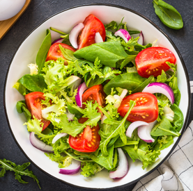Salada de rúcula com alface e tomate