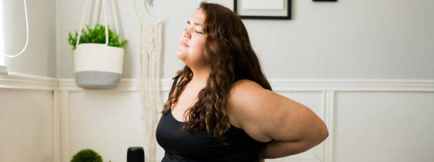 Qual a relação entre sobrepeso e obesidade vs problemas na coluna?