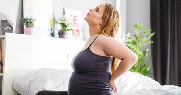 Dor nas costas na gravidez: Saiba como aliviar