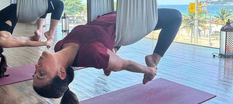 Fátima Bernardes pratica air yoga; saiba mais sobre a modalidade